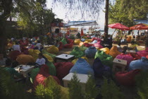 Brightly coloured bean bag cushions at local cafe popular with young Turkish people.Formerly Greek Physkos in Caria once host to AlexandeTurkish RivieracoastcoastalholidaySummerBar Bistro Color...