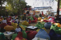 Brightly coloured bean bag cushions at local cafe popular with young Turkish people.Formerly Greek Physkos in Caria once host to AlexandeTurkish RivieracoastcoastalholidaySummerBar Bistro Color...