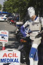 Olu Deniz.  Street advertising on mannequin for medical equipment  knee pads  sports protection  sling and neck support.Turkish rivieraAegeancoastcoastalmodeldisplaydemonstration Destination De...