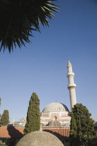 Rhodes Town.  Domed roof and minaret of the Suleyman Mosque in the Old Town against clear blue sky of early summer.AegeancoastcoastalFormer Ottoman territoryearlySummer seasonlocation of Guns o...