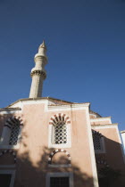Rhodes Town.  Part view of exterior facade and minaret of the Suleyman Mosque in the Old Town against clear blue sky of early summer.AegeancoastcoastalFormer Ottoman territoryearlySummer season...