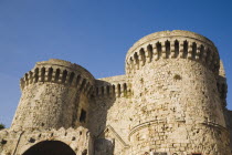 Amboise Gate entrance to Old Town Rhodes.  Fortified stone towers against clear blue sky.Aegeancoast  coastalFormer Ottoman territoryearly Summer seasonlocation of Guns of Navaronepackage holida...