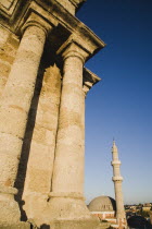 Rhodes Old Town.  View from nineteenth century Turkish clock tower and former look-out post towards domed rooftop and minaret of Suleyman mosque in late afternoon sun on cloudless clear summer day.Ae...