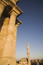 Rhodes Old Town.  View from nineteenth century Turkish clock tower and former look-out post towards domed roof and minaret of Suleyman mosque n late afternoon sun.AegeanGreekByzantineRodilocation...