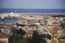 Rhodes Old Town.  View from Turkish clock tower over main shopping street of Odos Sokratous with Cruise ship in Mandraki harbour behind on early Summer evening.AegeanRodiseacoast coastalOttomanU...