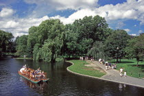 Swan boat in Boston Public Garden.TravelTourismHolidayVacationExploreRecreationLeisureSightseeingTouristAttractionTourDestinationTripJourneyDaytripActivityOutingSwanBoatPublicGard...