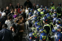 England  London  City  Threadneedle Street  Bank of England G20 Protests  April 2009. Protesters reading book on Spanish Civil War.European UKUnited KingdomGBGreat BritainEuropeEuropeanMeeting...