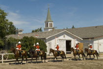 North West Mounted Police Musical Ride at the NWMP Fort.Women Ladies American Canadian North America Northern Blue Female Woman Girl Lady