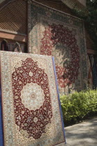Kusadasi.  Carpets displayed at Club Caravanserail built by vizier Okuz Mehmed Pasha in 1618 for the Ottoman Sea trade.  Restored in 1966  now used as a boutique hotel with Turkish carpet  kilim and t...