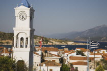 Pythagorio.  Metamorfosis Sotiros Greek orthodox church.  Bell and clocktower with view over town and bay and Turkish coast  five kilometers away in distant background.North Eastern AegeanGreek Isla...