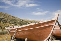 Pythagorio.  Traditional hand built wooden fishing boats under construction.North Eastern AegeanGreek IslandsPithagorion Pythagorioncoast coastalseaSummerpackageholidayresortvacationtripde...