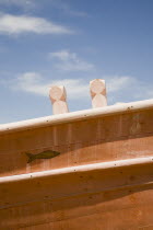 Pythagorio.  Detail of fish drawn for good luck and safety of crew on traditional handbuilt wooden fishing boats under construction.North Eastern AegeanGreek IslandsPithagorion Pythagorioncoast c...