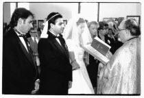 Traditional Greek Wedding ceremony. Bride  Groom  Bridesmaid and Best man standing in front of Priest.Religion Religion Religious Christianity Christians Marriage Marrying Espousing Hymeneals Nuptial...