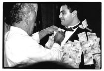Traditional Greek Wedding ceremony. Money being pinned to the Groom.Classic Classical European Historical Marriage Religion Religion Religious Christianity Christians Marriage Marrying Espousing Hyme...