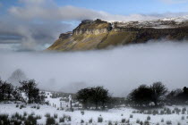 Kings Mountain with mist and snow in the valley below. WeatherWinterIrelandEireRepublicEuropeEuropeanIrishLandscapeSligoAtmosphereLightMountainsSnowMistWinter Eire European Irish Northe...