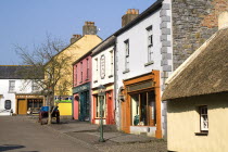 The Village Street denotes village life in 19th century Ireland  Gaslamp outside shops with traditional fronts.Eire European Irish Northern Europe Republic Ireland Poblacht na hEireann Blue Classic C...