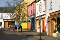 The Village Street denotes village life in 19th century Ireland  Gaslamp outside shops with traditional fronts.Eire European Irish Northern Europe Republic Ireland Poblacht na hEireann Blue Classic C...