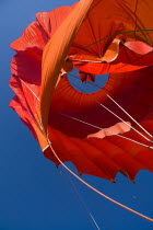 Turkey, Cappadocia, Goreme, Hot air balloons in flight over landscape, Close up of a section of a hot air balloon as it deflates.