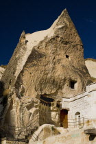 Turkey, Cappadocia, Goreme, Cave dwelling wth visible erosion of wall.