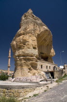 Turkey, Cappadocia, Goreme, Cave dwelling wth visible erosion of wall.