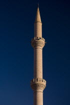 Turkey, Cappadocia, Goreme, Minaret of a Mosque in the town centre.