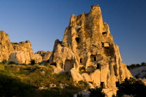 Turkey, Cappadocia, Goreme, Goreme Open Air Museum, The Nun's Convent or Nunnery is 7 storeys high and once housed as many as 300 nuns. Evening Light