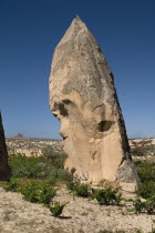 Turkey, Cappadocia, Goreme, Sword Valley, The valley got its name because of all the sharp pinnacles to be found there. The hilltop town of Uchisar can be seen in the background.