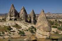 Turkey, Cappadocia, Goreme, Sword Valley, The valley got its name because of all the sharp pinnacles to be found there. The hilltop town of Uchisar can be seen in the background.