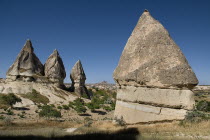 Turkey, Cappadocia, Goreme, Sword Valley, The valley got its name because of all the sharp pinnacles to be found there. The hilltop town of Uchisar can be seen in the background.