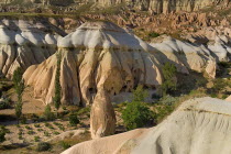 Turkey, Cappadocia, Goreme, Rose and Red Valleys, The Church of the Three Crosses sitting amidst the rocks.