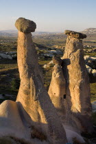 Turkey, Cappadocia, Goreme, Urgup, Fairy Chimneys with their hats on.