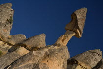 Turkey, Cappadocia, Goreme, Pasabag, Fairy Chimney with rock perched in gravity defying position.
