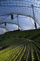 Germany, Bavaria, Munich, Olympic Stadium, Olympiastadion, Built as the main venue for the 1972 Summer Olympics, Large sweeping canopies of acrylic glass stabilised by steel cables meant to represent...