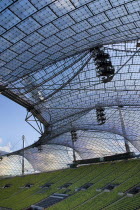 Germany, Bavaria, Munich, Olympic Stadium, Olympiastadion, Built as the main venue for the 1972 Summer Olympics, Large sweeping canopies of acrylic glass stabilised by steel cables meant to represent...