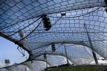 Germany, Bavaria, Munich, Olympic Stadium, Olympiastadion, Built as the main venue for the 1972 Summer Olympics, Large sweeping canopies of acrylic glass stabilised by steel cables meant to represent...