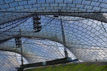 Germany, Bavaria, Munich, Olympic Stadium, Olympiastadion, Built as the main venue for the 1972 Summer Olympics, Large sweeping canopies of acrylic glass stabilised by steel cables meant to represent...