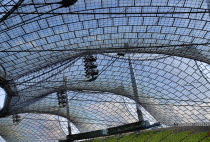 Germany, Bavaria, Munich, Olympic Stadium, Olympiastadion, Built as the main venue for the 1972 Summer Olympics, Large sweeping canopies of acrylic glass stabilised by steel cables meant to represent...