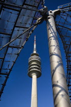 Germany, Bavaria, Munich, Olympic Tower, Olympiaturm, Surrounded by the architecture of the stadium.