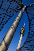 Germany, Bavaria, Munich, Olympic Tower, Olympiaturm, Surrounded by the architecture of the stadium.