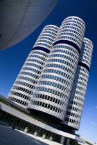 Germany, Bavaria, Munich, BMW Headquarters, The BMW Tower is 101 metres tall and mimics the shape of tyres.