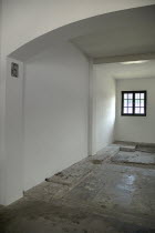 Germany, Bavaria, Munich, Dachau World War II Nazi Concentration Camp Memorial Site, empty interior reconstructed prisoner barracks.