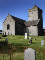 St. Clements Church with gravestones in the cemetary in the foreground.European Alasdair CrotachAlexander VII of Harris Alba Blue Gray Great Britain Northern Europe Religion Religious UK United King...