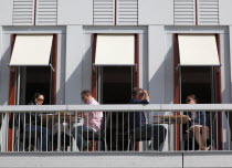 Neumarkt  Cafe bar  with people eating on balcony.Destination Destinations Deutschland European History Holidaymakers Sachsen Tourism Tourist Western Europe Saxony Sightseeing Tourists Bistro History...