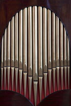 England, West Sussex, Chichester, Caathedral interior, Detail of minature organ showing the pipes.