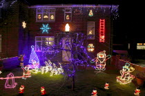 England, West Sussex, Southwick, Cul de Sac of house decorated with fairy lights for Christmas.