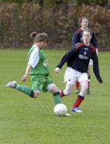 Scotland, Tesco Cup, Ladies Soccer Championship, Player kicking the ball.