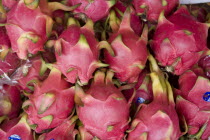 Thailand, Chiang Mai, Close up of Dragon fruit  on sale in market.