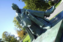 USA, New York, Cooperstown, statue of James Fenimore Cooper in Cooper Park next to Baseball Hall of Fame.