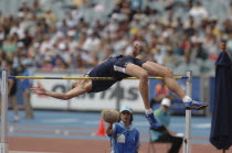Sport, Athletics, High Jump, High Jumper Mark Taylor, doing the Fosbury Flop, Commonwealth Games Melbourne Australia 2006.