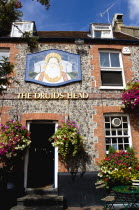 England, East Sussex, Brighton, The Lanes The Druids Head one of the oldest pubs in the city dating from 1510 with flower in hanging baskets.